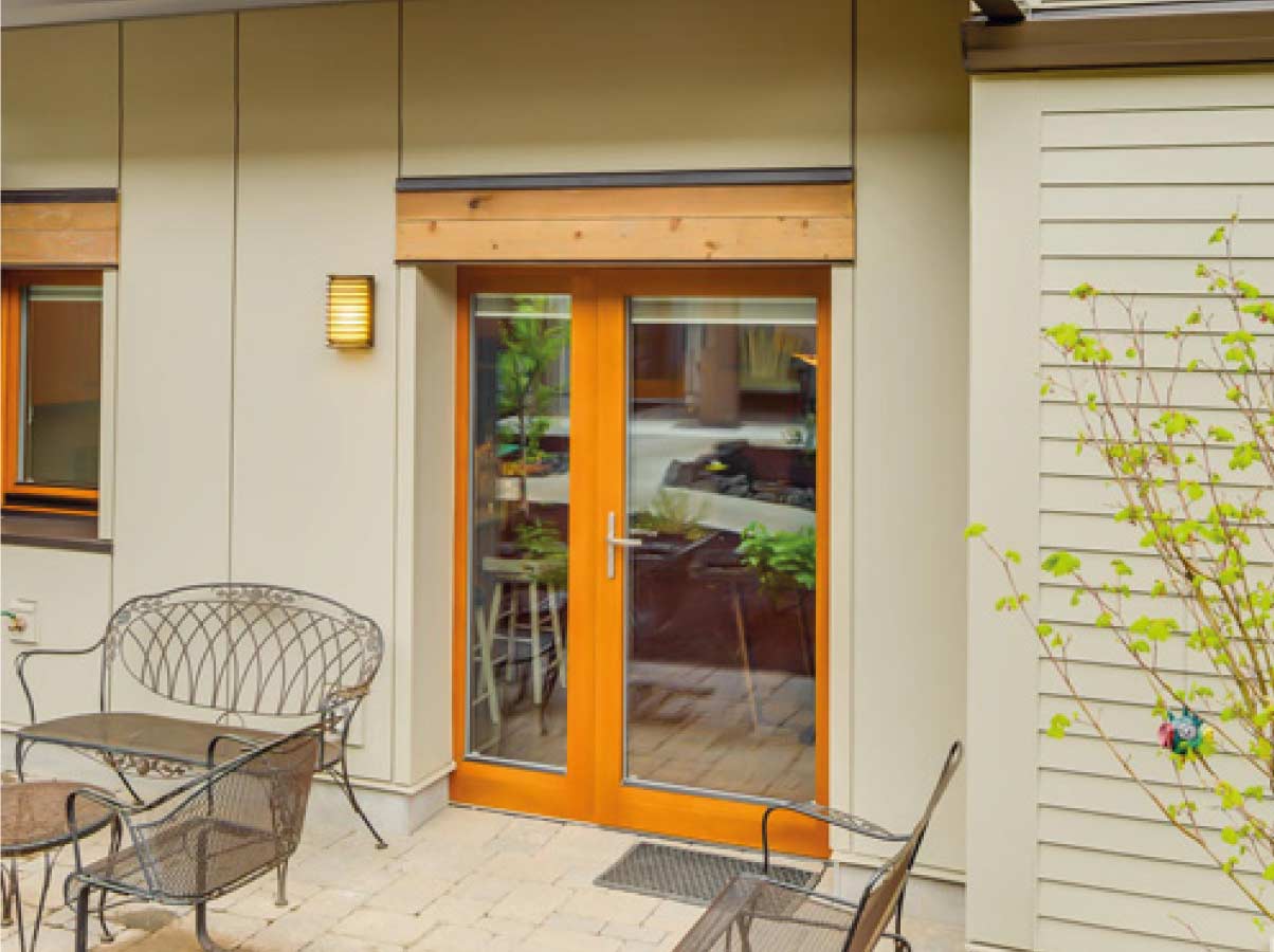 Puerta batiente entrada hogar con vista interior